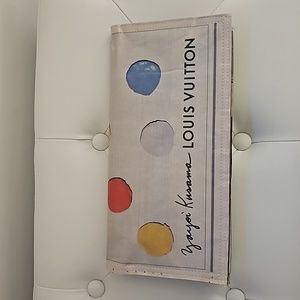 Not an Authemtic LV. Made of recycled newspaper.